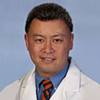 Michael J. Tan